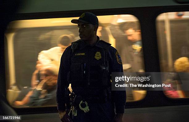 Heightened security by Transit police is evident at Metro Center after the bombing at the Boston Marathon Monday April 15, 2013 in Washington, DC.