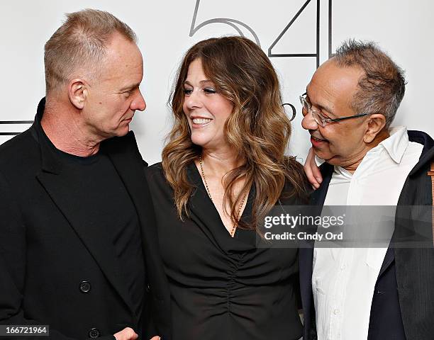 Sting and George C. Wolfe pose with Rita Wilson backstage following her performance at 54 Below on April 15, 2013 in New York City.