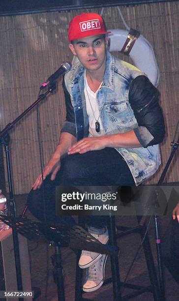 Singer Carlos Pena of Big Time Rush performs at the the Big Time Rush press conference and tour announcement held at House of Blues on April 1, 2013...