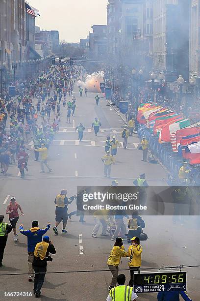 Second explosion goes off near the finish line of the 117th Boston Marathon on April 15, 2013.