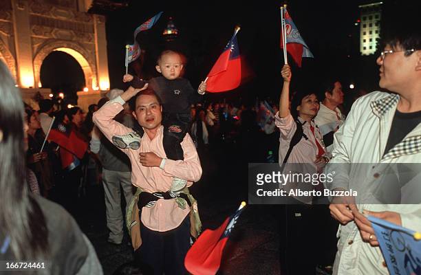 And PFP supporters in front of Chiang Kai Shek Memorial Hall in the occasion of a political rally..