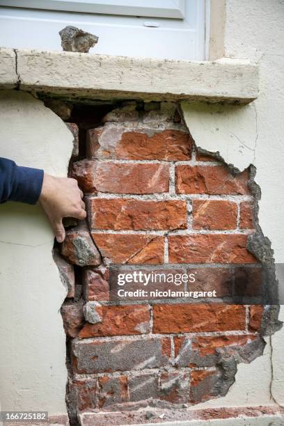 structural problem: crack in wall - cracked foundation stock pictures, royalty-free photos & images