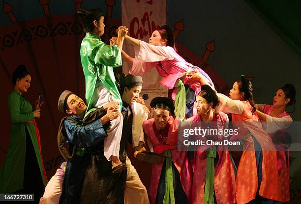 Cheo opera artists during the rehearsal of the famous Vietnamese Cheo Opera named Ho Xuan Huong in Hanoi. Like other Vietnamese traditional arts,...