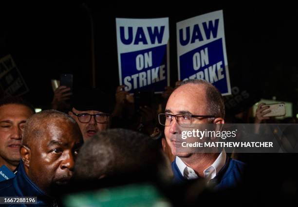 President Shawn Fain speaks with members of the media and members of the UAW outside of the UAW Local 900 headquarters across the street from the...