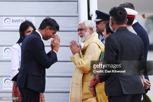 Prime Minister Rishi Sunak and his wife Akshata Murty are met on the tarmac by dignitaries including the Indian Minister of State and Alex Ellis, the...