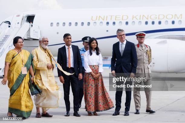 Prime Minister Rishi Sunak his wife Akshata Murty arrive at Indira Gandhi Airport for an official visit ahead of the G20 Summit, on September 8, 2023...