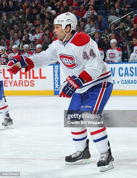 Davis Drewiske of the Montreal Canadiens prepares for a faceoff against the Buffalo Sabres on April 11, 2013 at the First Niagara Center in Buffalo,...