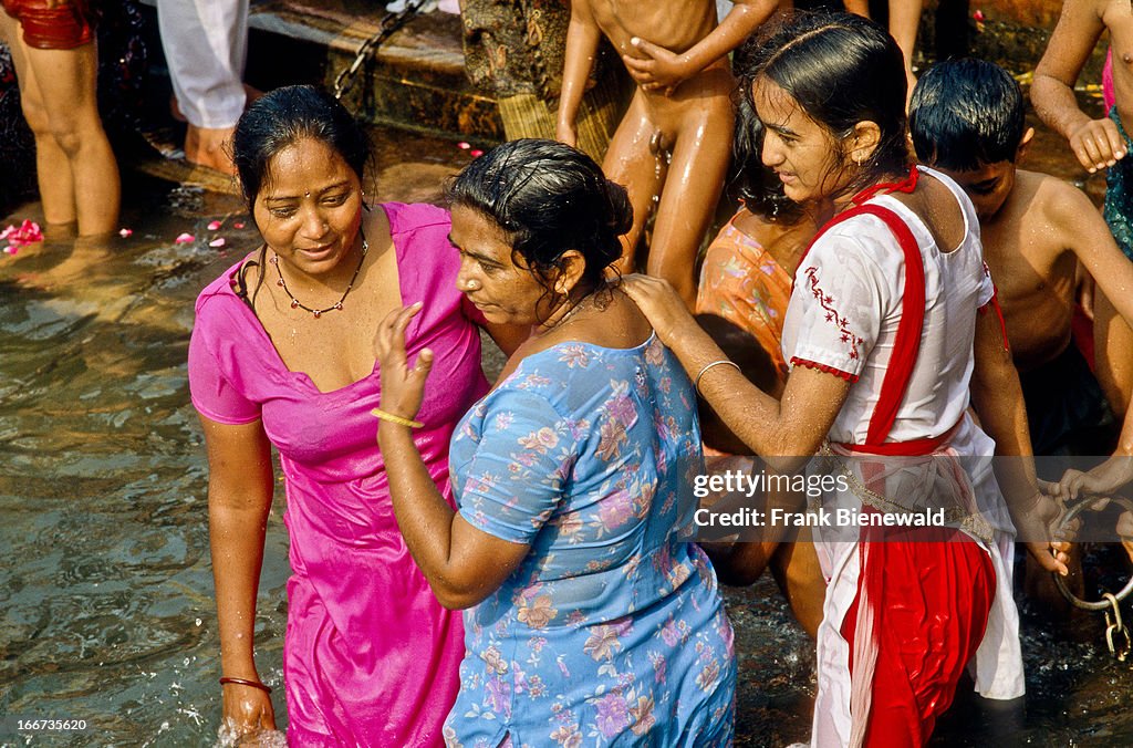 A group of women taking bath at Har-Ki-Pauri-Ghat, the...