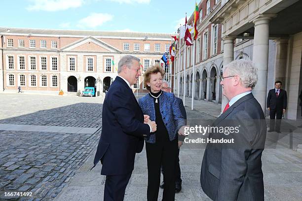 In this handout image provided by the Dept of the Taoiseach, Former Vice President of the United States, Al Gore is welcomed to Dublin Castle by Mary...
