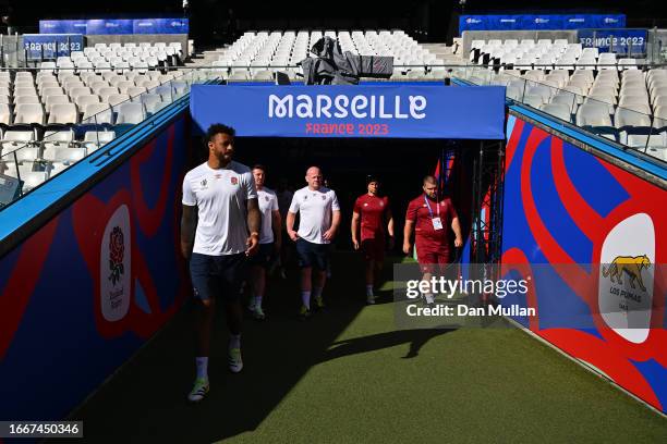 Courtney Lawes of England leads the team out of the tunnel during the Captain's Run ahead of their Rugby World Cup France 2023 match against...