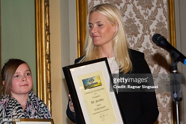 Princess Mette-Marit of Norway presents the Co-Op environmental awards at National Theatre on April 16, 2013 in Oslo, Norway.