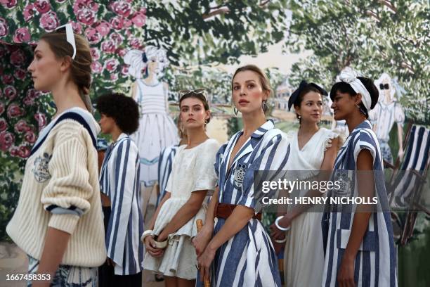 Models rehearse backstage before Irish designer Paul Costelloe's catwalk presentation for his Spring/Summer 2024 collection during London Fashion...