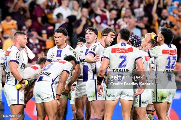 Storm players reacts after a Broncos try during the NRL Qualifying Final match between the Brisbane Broncos and Melbourne Storm at Suncorp Stadium on...