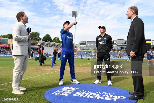 England captain Jos Buttler tosses the coin alongside New Zealand captain Tom Latham ahead of the 1st Metro Bank One Day International between...