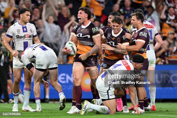 Jordan Riki of the Broncos celebrates with team mates after scoring a try during the NRL Qualifying Final match between the Brisbane Broncos and...