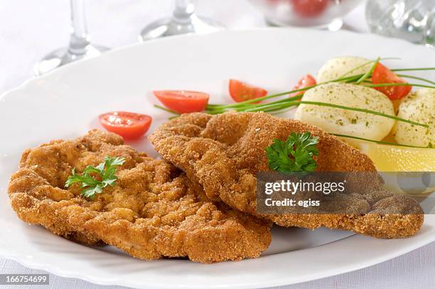 veal schnitzel - breaded veal stock pictures, royalty-free photos & images