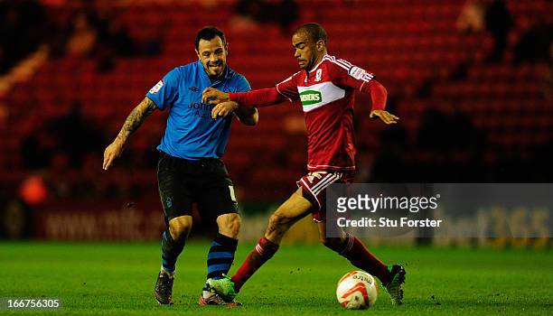 Middlesbrough player Kieron Dyer is challenged by Andy Reid during the npower Championship match between Middlesbrough and Nottingham Forest at...