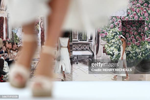 Models present creations by Irish designer Paul Costelloe during a catwalk presentation for his Spring/Summer 2024 collection during London Fashion...