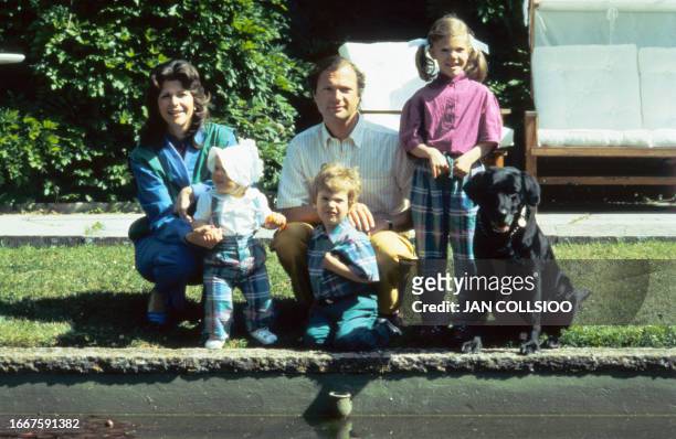 King Carl Gustaf of Sweden and his wife Queen Silvia pose, 29 june 1983 with their children Crown princess Victoria, Prince Carl Philip and Princess...