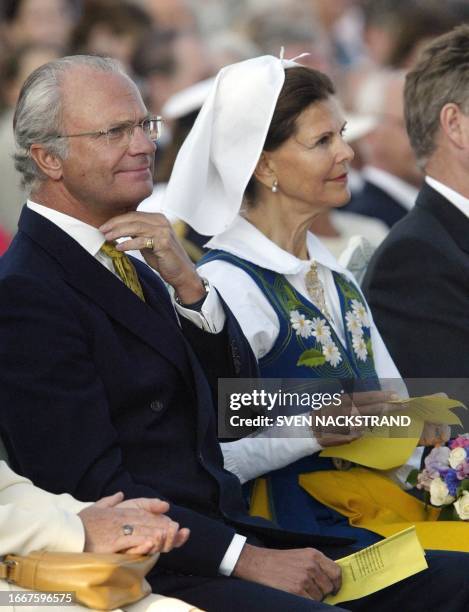 Swedish King Karl Gustav and Queen Sylvia during Swedish National Day celebrations at the Skansen park in Stockholm 06 June 2003. AFP PHOTO / SVEN...