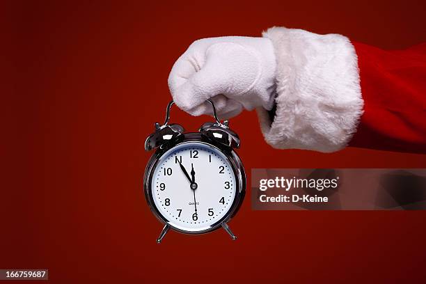 alarm clock - alarm clock hand stock pictures, royalty-free photos & images