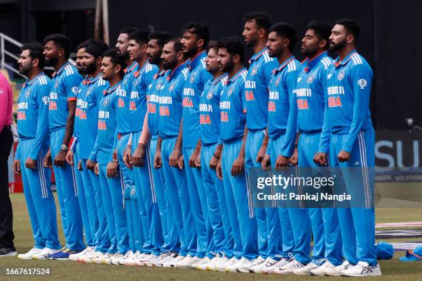 Indian players stand for the National anthem during the Asia Cup match between India and Bangladesh at R. Premadasa Stadium on September 15, 2023 in...