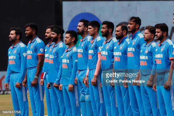 Indian players stand for the National anthem during the Asia Cup match between India and Bangladesh at R. Premadasa Stadium on September 15, 2023 in...