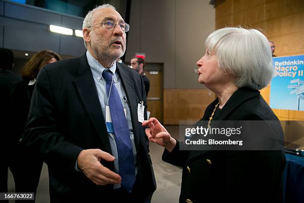 Joseph Stiglitz, Nobel prize-winning economist and professor of economics at Columbia University, left, speaks to Janet Yellen, vice chairman of the...