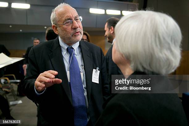 Joseph Stiglitz, Nobel prize-winning economist and professor of economics at Columbia University, left, speaks to Janet Yellen, vice chairman of the...