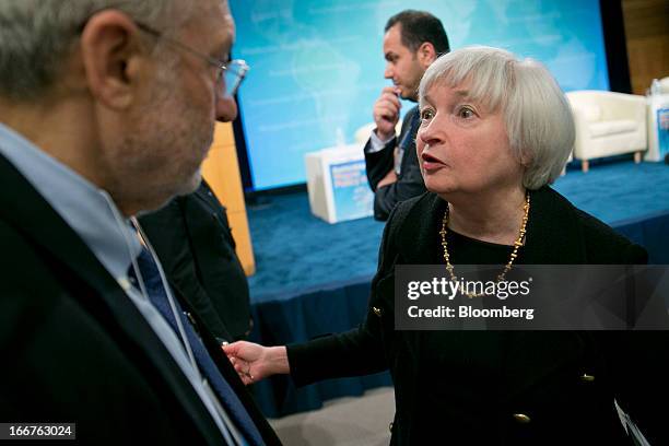 Janet Yellen, vice chairman of the U.S. Federal Reserve, right, speaks to Joseph Stiglitz, Nobel prize-winning economist and professor of economics...