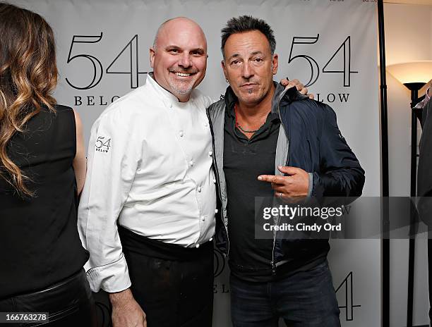 Below's Chef Andre Marrero poses with Bruce Springsteen backstage following Rita Wilson's performance at 54 Below on April 15, 2013 in New York City.