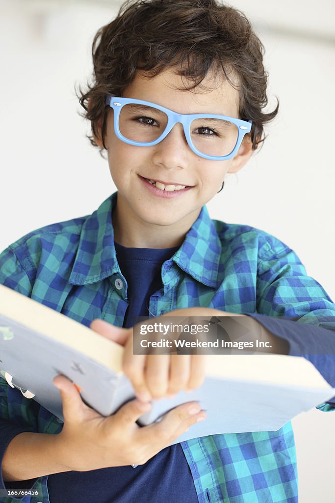 Boy reading a textbook