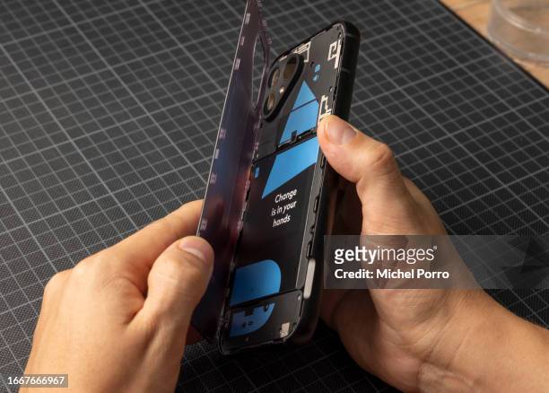 The replacement of the battery, one of ten components of the Fairphone 5, the world’s first customer repairable mobile phone, is showed on September...