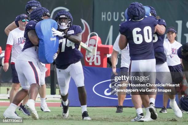 Houston Texans offensive tackle George Fant runs a drill with the offensive line during an NFL training camp Tuesday, Aug. 8 in Houston.