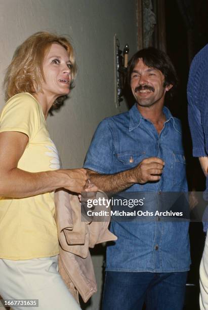 Angie Dickinson and Tom Skerritt attend an event, United States, circa 1980s.