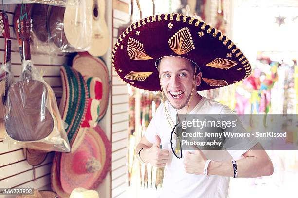 young man wearing sombrero hat. - sombrero 個照片及圖片檔