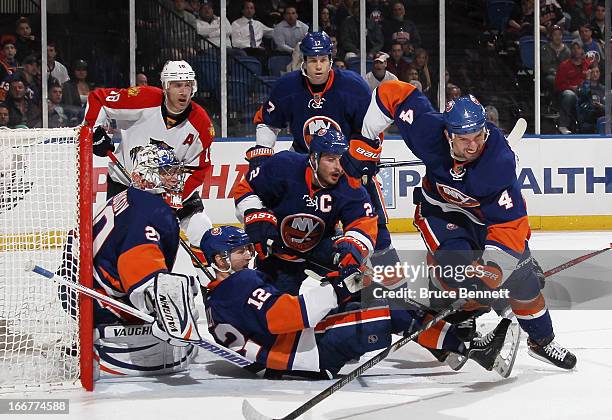 Evgeni Nabokov and the New York Islanders makes the third period goal stand against the Florida Panthers at the Nassau Veterans Memorial Coliseum on...