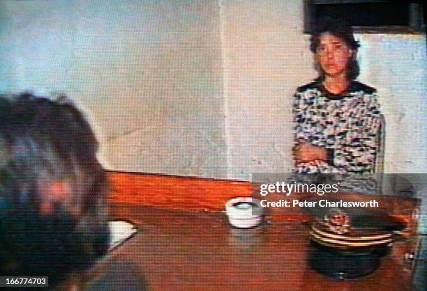 Grab frame" picture from a TV screen showing Chinese State Television footage of an interrogation of a Tiananmen Square protestors who has been...