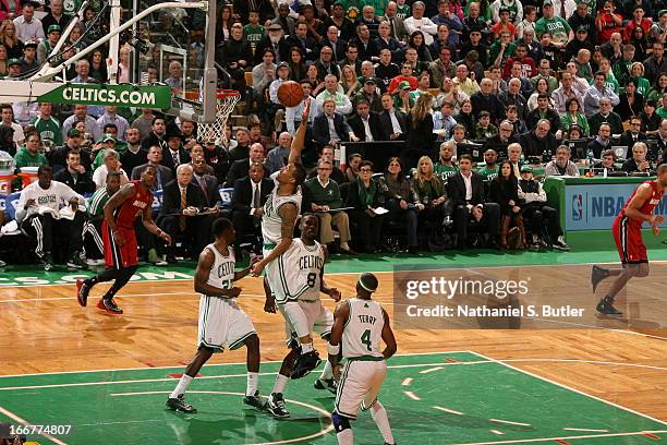 Fab Melo of the Boston Celtics goes up for the dunk against the Miami Heat during a game on March 18, 2013 at TD Garden in Boston, Massachusetts....