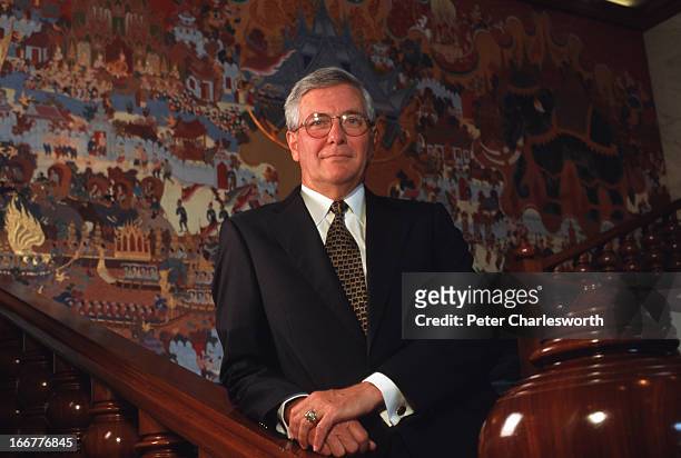 John F. Imle Jr., vice chairman and member of the Management Committee of Unocal, poses for a portrait on the stairs of the Regent Hotel during a...