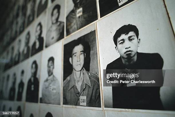 Hundreds of photographs line the walls of the Tuol Sleng Museum in Phnom Penh. The museum is in a former school that the Khmer Rouge turned into...