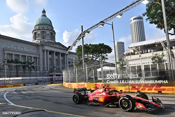 Ferrari's Spanish driver Carlos Sainz Jr drives during the first practice session for the Singapore Formula One Grand Prix night race at the Marina...