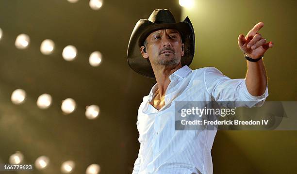 Tim McGraw performs during Keith Urban's Fourth annual We're All For The Hall benefit concert at Bridgestone Arena on April 16, 2013 in Nashville,...