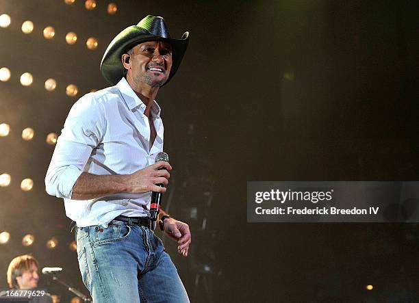 Tim McGraw performs during Keith Urban's Fourth annual We're All For The Hall benefit concert at Bridgestone Arena on April 16, 2013 in Nashville,...