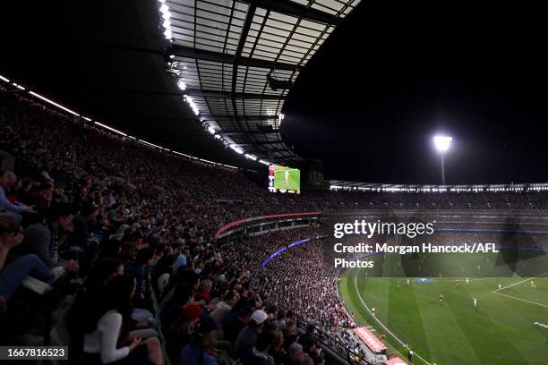 Crowds watch on during the 2023 AFL First Semi Final match between the Melbourne Demons and the Carlton Blues at Melbourne Cricket Ground on...