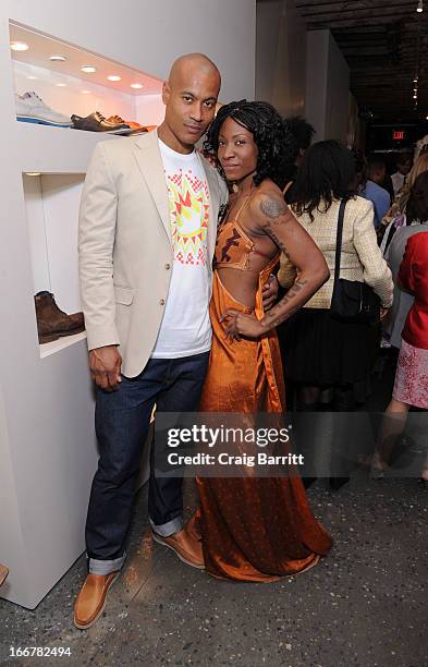 Daughter of late United Nations Ambassador and celebrity activist Africa Engo poses with super model and actor Max Tapper at the Pikolinos pop up...