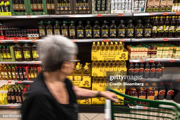 Shelves of olive oil at a Mercadona SA supermarket in Barcelona, Spain, on Thursday, Sept. 14, 2023. Bloomberg's monthly index, which calculates how...