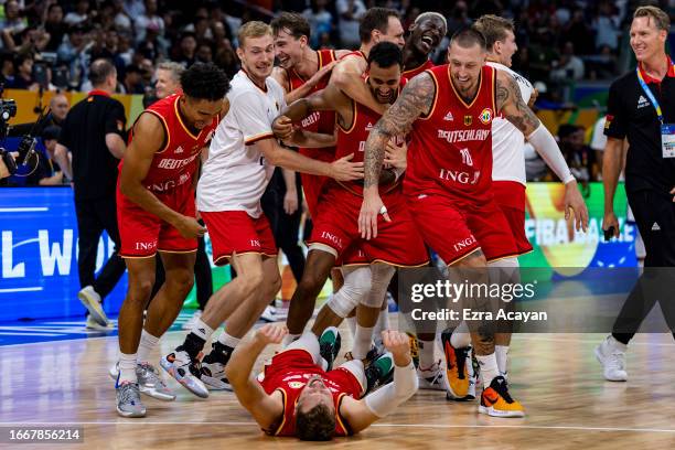 Germany team celebrates after winning the FIBA Basketball World Cup Semi Final game between USA and Germany at Mall of Asia Arena on September 08,...