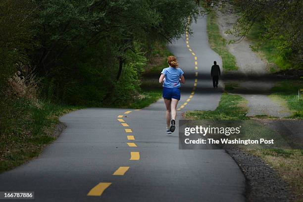 Day after two bombs were detonated at the finish line of the Boston Marathon, runners take to W&OD trail between Reston Parkway and Wiehle Avenue on...