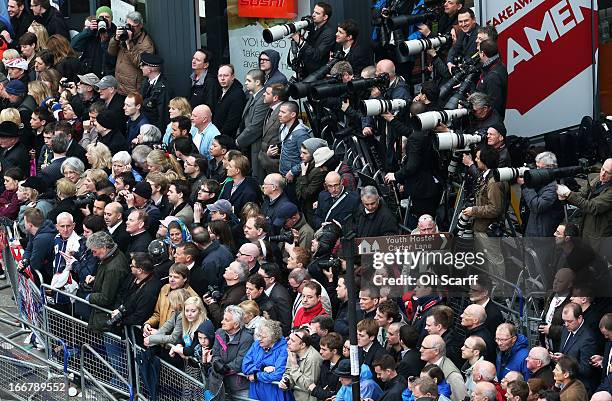 Members of the public and photographers during the Ceremonial funeral of former British Prime Minister Baroness Thatcher at St Paul's Cathedral on...